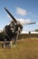 Vertical shot of the propeller of a plane landed on the dry grass