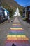 Vertical shot of rainbow road in rural town of Seydisfjordur, Iceland