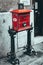 Vertical shot of a red mailbox in the streets of Budapest