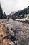 Vertical shot of a road in the valley in the Austrian Alps