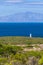 Vertical shot of a rock formation at the ocean shore in Cape of Good Hope, Cape Town, South Africa