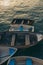 Vertical shot of row boats docked at St Ives harbor