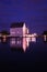 Vertical shot of s house illuminated at sunset in the harbor of Munster, Germany