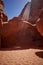 Vertical shot of a sand dune arch in  Arches National park