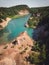 Vertical shot of seaside, cliffs, and trees