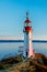 Vertical shot of the Sheringham Lighthouse near Shirley, Canada