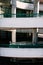 Vertical shot of a spiral ramp in a concrete parking garage