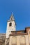 Vertical shot of St Magnus The Martyr in London, the UK with a clear blue sky background