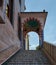 Vertical shot of stairs leading up to a decorative arched dome entrance