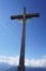 Vertical shot of the summit cross Sankt Barbara at the peak of Hohe Veitsch in Styria, Austria