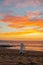 Vertical shot of the sunset on a beach on the Marthas Vineyard