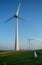 Vertical shot of tall wind-turbines along the Westermeerdijk in the Netherlands