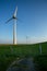 Vertical shot of tall wind-turbines along the Westermeerdijk in the Netherlands