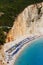 Vertical shot of the tents and the turquoise water of the Porto Katsiki Beach in Lefkada, Greece