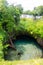 Vertical shot of the To-Sua Ocean Trench under the sunlight in the Upolu Island, Samoa