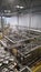 Vertical shot of the tools inside of a microbrewery factory in Iceland