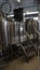 Vertical shot of the tools inside of a microbrewery factory in Iceland