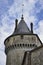 Vertical shot of the tower of Chateau de la Brede castle