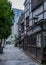 Vertical shot of traditional Japanese houses in Koishikawa Botanical Gardens in Tokyo