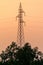 Vertical shot of a transmission tower in a Spanish Dehesa during the sunset in Salamanca, Spain