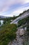 Vertical shot of a walking trail alongside Echo Lake at sunset, in California, United States