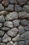 Vertical shot of a wall made of stones