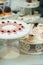 Vertical Shot Wedding Dessert Fruit Jelly Raspberries Chocolate Cups Marshmalows Table Set.