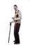 Vertical shot of a white Caucasian man in a grandfather costume holding a walking stick