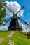 Vertical shot of a windmill in Vesting Bourtange, Netherlands