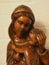 Vertical shot of a wooden Mother Marry sculpting statue