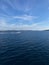 Vertical shot of a yacht driving on a lake