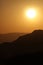 Vertical Silhouette Sunrise of Hazy Misty Mountain
