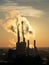 Vertical of a steaming power station in Vienna, Austria at golden hour