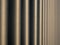 Vertical steel bars compressed perspective, shallow depth of field
