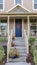 Vertical Steps to an elevated front door of a house