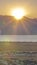 Vertical Sunrise over the mountains above Utah Lake