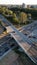 Vertical time-lapse view of cars driving on cross streets