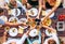 Vertical top view on served table and hands with clinking goblet