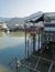 Vertical traditional Hong Kong old wooden house, boat and river in countryside