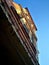 Vertical undershot of an old house from Cavic in Novi Pazar with sky in the background