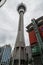 Vertical undershot of the TV Tower in Auckland, cloudy and gloomy sky background