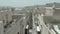 Vertical uplift, drone flying through beautiful old street, Valletta, Malta. Old, vintage balconies, road, city from top.