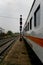 Vertical vanishing point shot of a railroad with a modern train