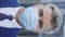 Vertical Video. Close Up of Face of Mature Caucasian Handsome Boss in Medical Mask Looking Straight to Camera with Happy