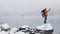 Vertical video. Handsome american hiker man video calling on smartphone, waving at camera, smiling and speaking with