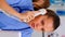 Vertical video: Medical practitioner answering phone calls