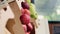 Vertical video Natural ripe colorful apples in crates