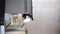 Vertical video - view of a home coffee macine preparing coffee.