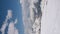 Vertical video. View from Mount Elbrus to the snow-covered ridge of the Caucasus Mountains.