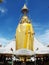 Vertical view of the 32 meter tall Buddha at Wat Intharawihan in Bangkok, Thailand